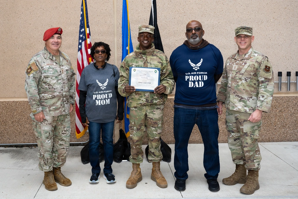 Family celebrating together during a Lackland BMT graduation visit