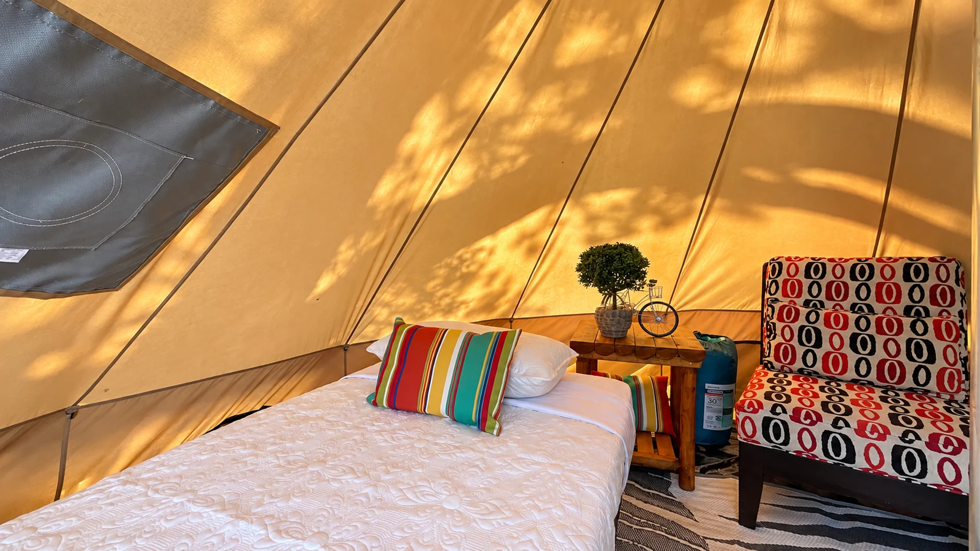Interior of the private glamping tent at Glampstead Retreat in San Antonio