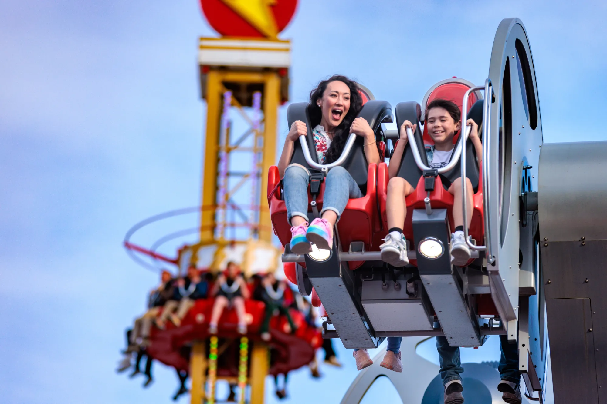 Family enjoying rides at Six Flags Fiesta Texas in San Antonio